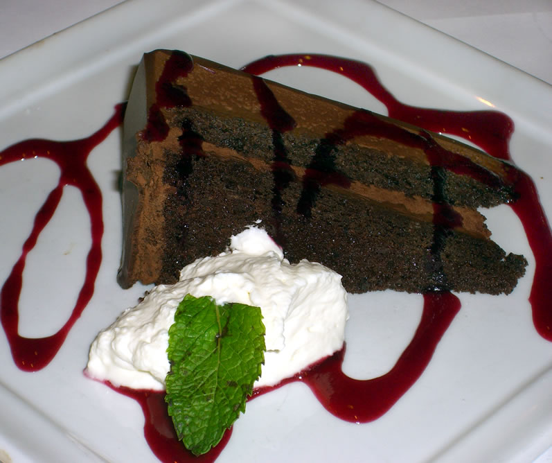 Serafina's Chocolate Grappa Cake with Black Currant Sauce