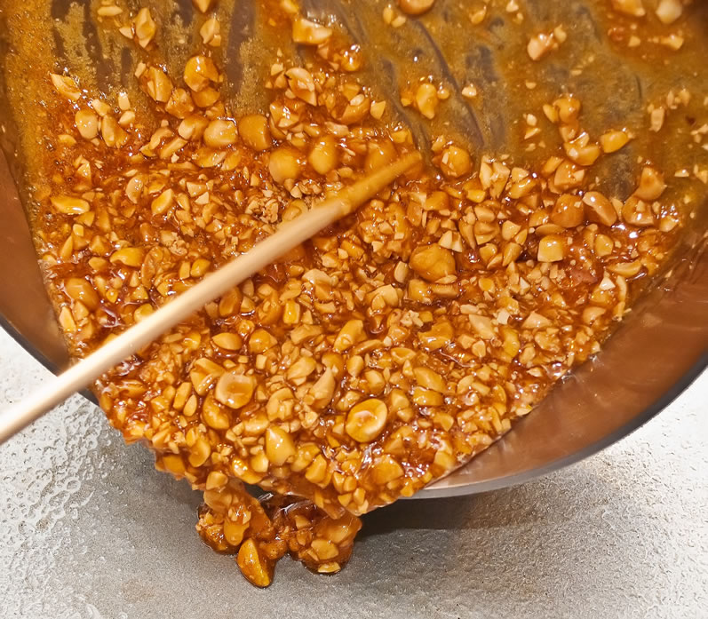 Pouring brittle into a cooling pan