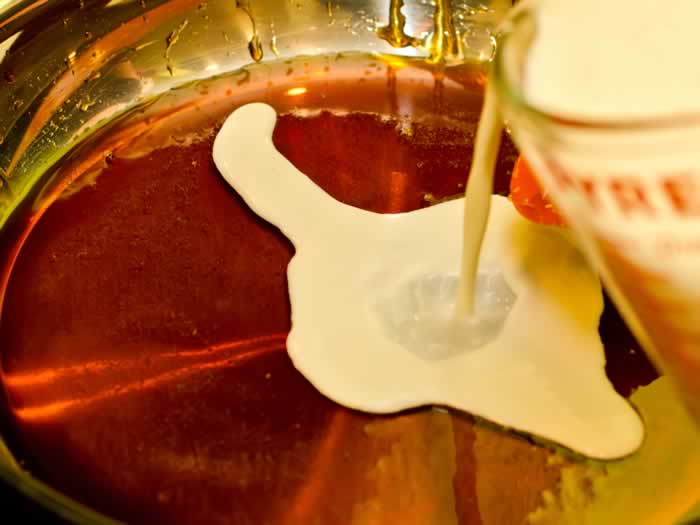 Pouring Milk into Caramelized Sugar