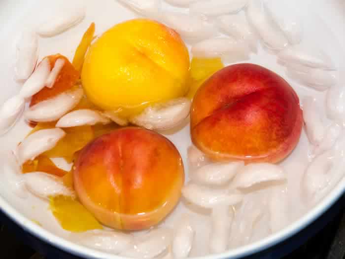 Blanched Peaches in Ice Water